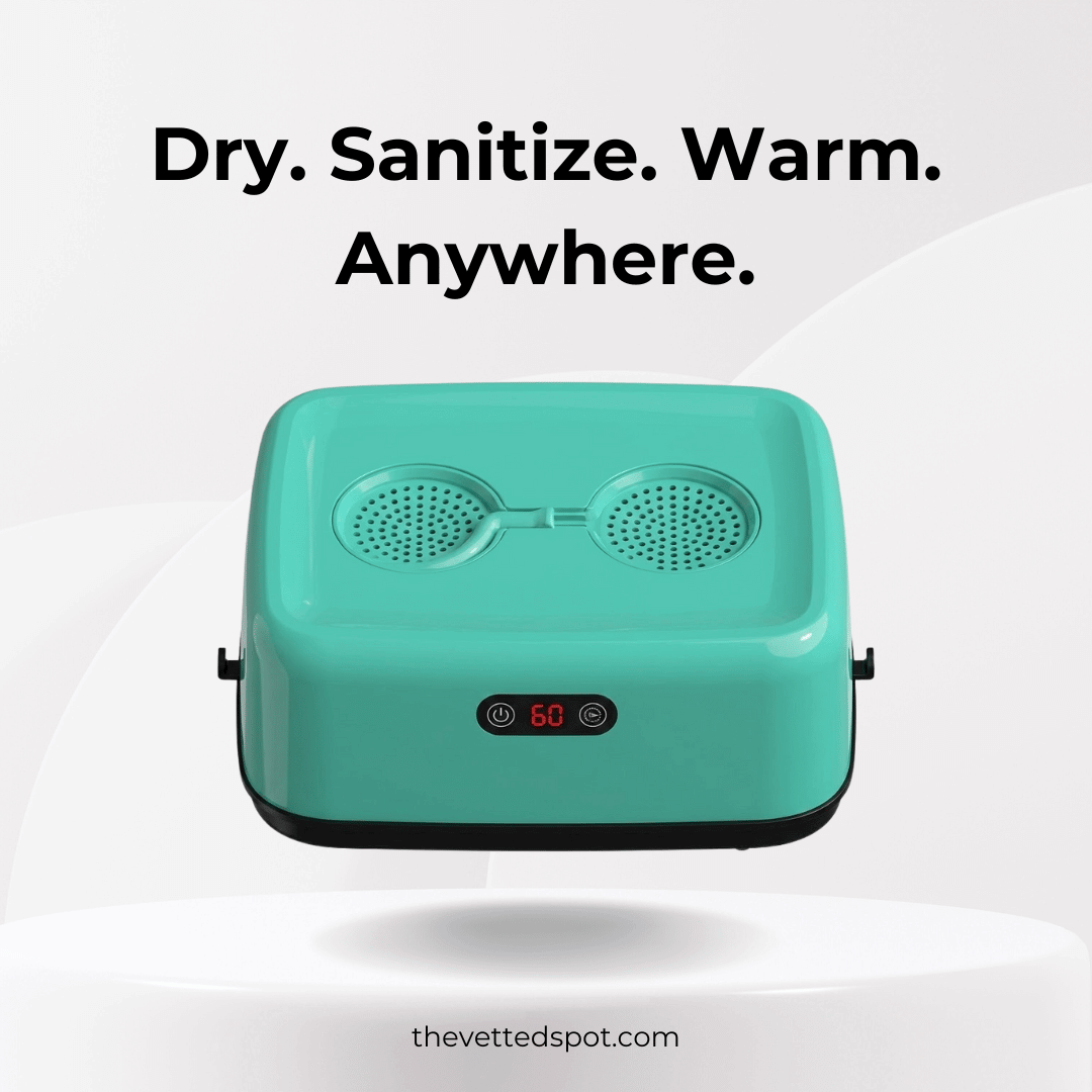 Green Clouddry Electric portable clothes dryer hanging on rack with drying bag expanded, showing compact design for apartments and RVs.